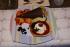 Dessert:  1. Limettenmousse auf Himbeerspiegel in einem Gebäckkörbchen   2. Grandmarnier-Parfait auf Gewürzorangen