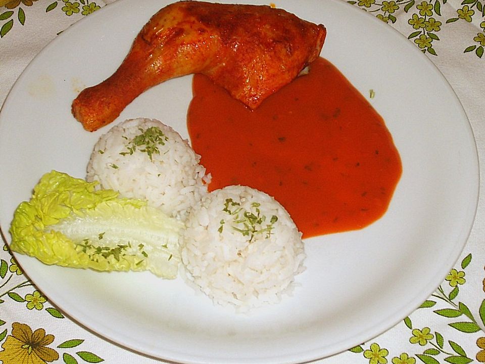 Hähnchenkeulen auf Tomatensoße und Reis von susili101| Chefkoch