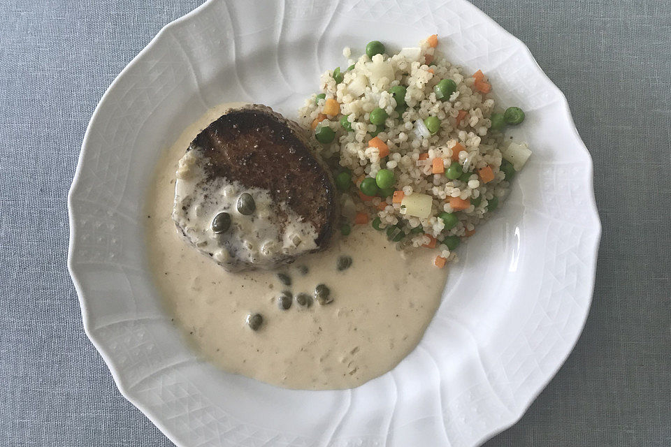 Kalbssteaks natur auf Graupen - Erbsen - Risotto mit Kapernsauce