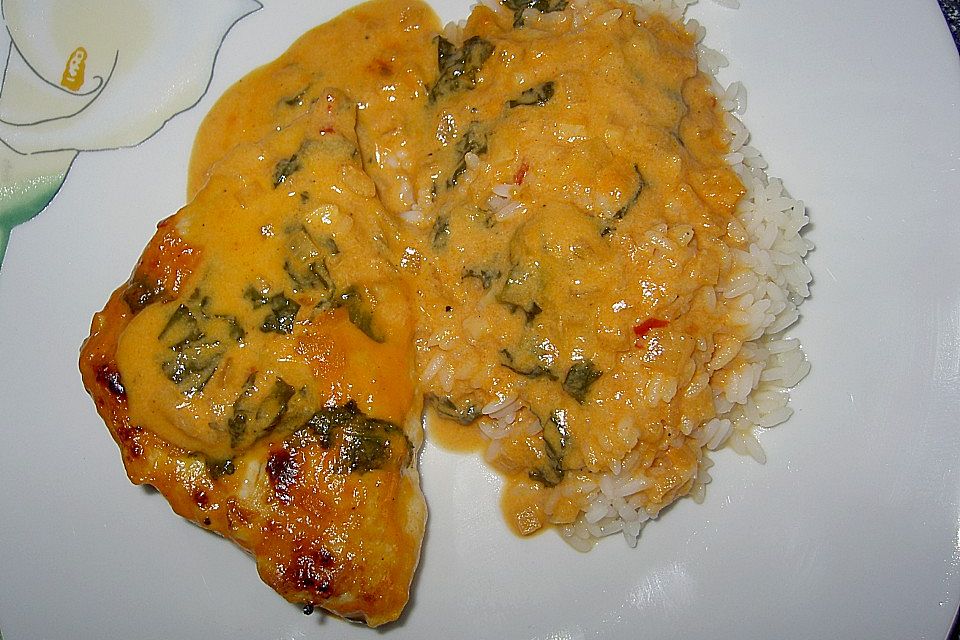 Pangasiusfilet in Weißwein - Sahnesoße mit Reis