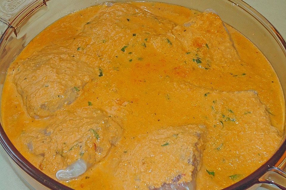 Pangasiusfilet in Weißwein - Sahnesoße mit Reis