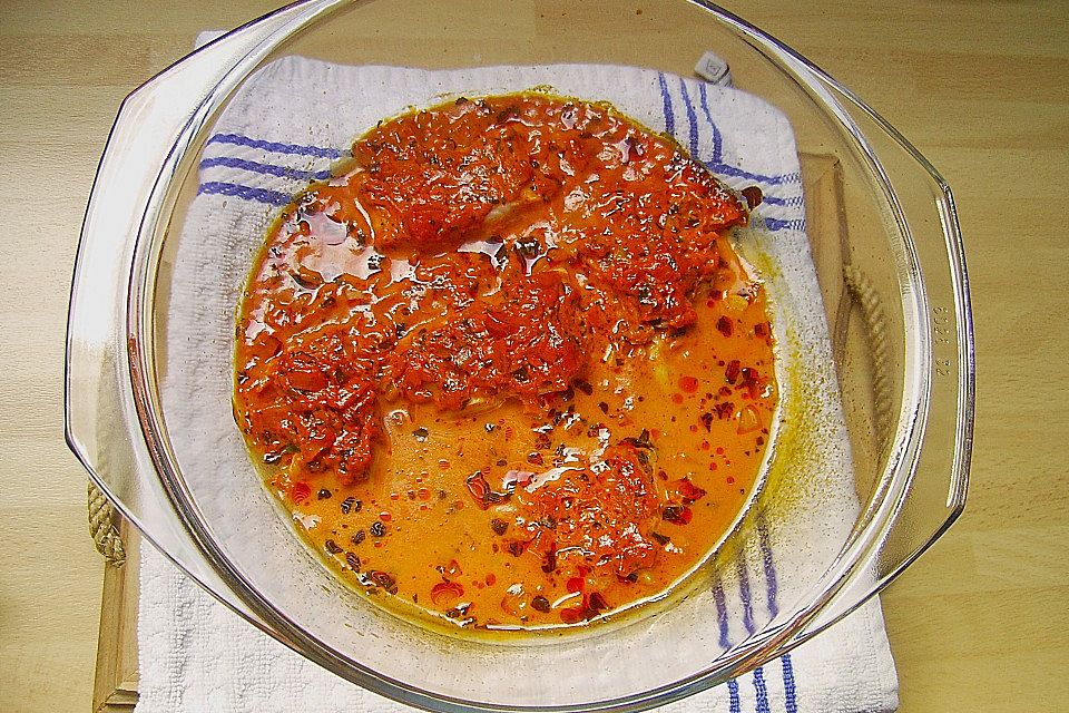 Pangasiusfilet in Weißwein - Sahnesoße mit Reis