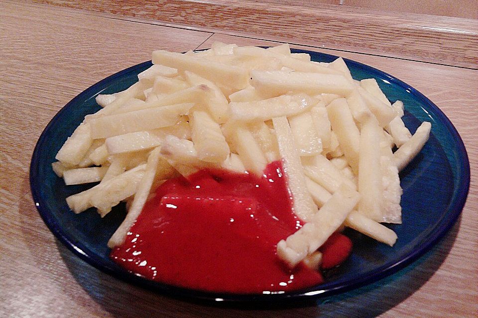 Ananas-Fritten mit Himbeer-Ketchup