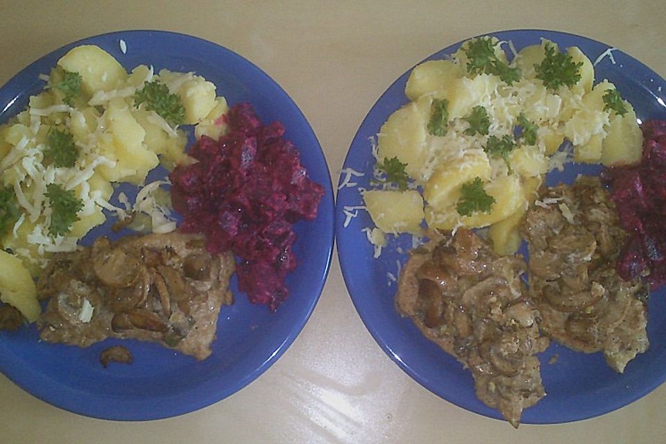 Schnitzel vom Schwein mit Champignons