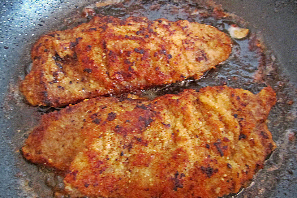 Schnitzel vom Schwein mit Champignons