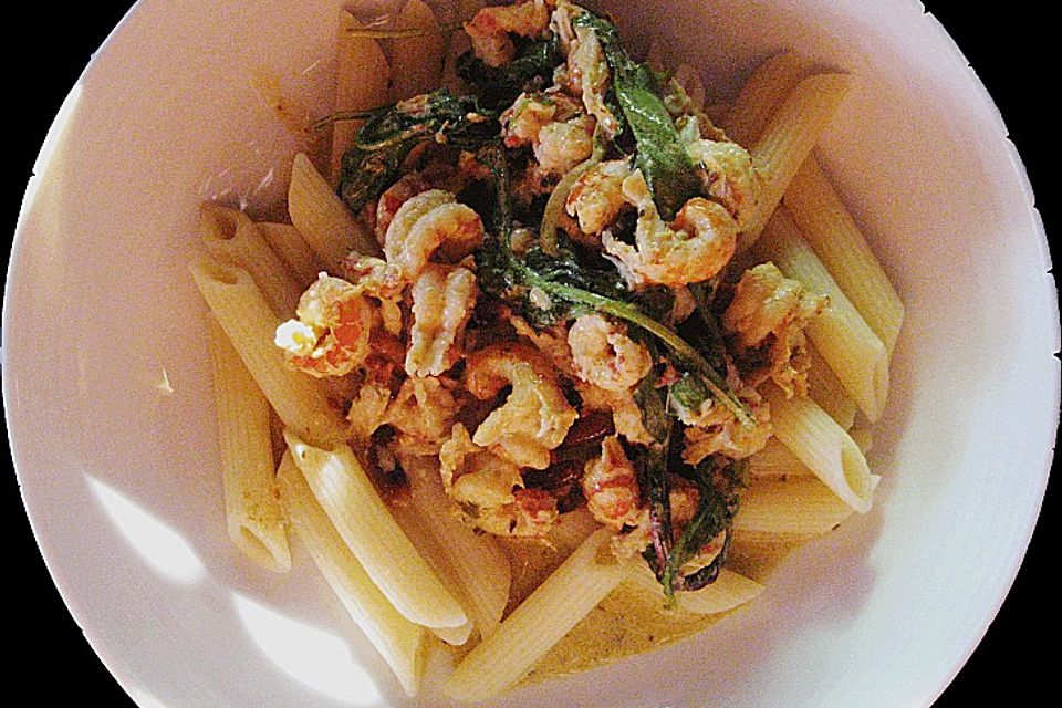 Penne mit Flusskrebsfleisch und Rucola