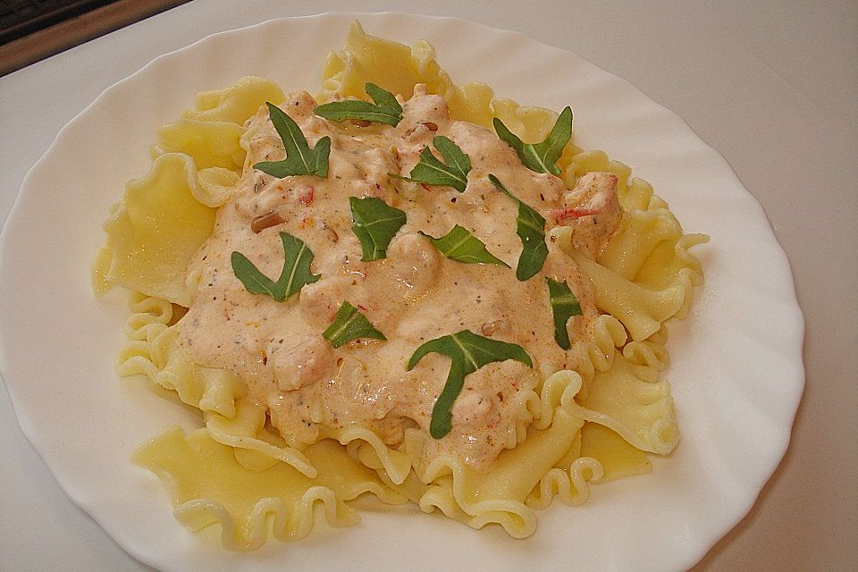 Penne mit Flusskrebsfleisch und Rucola