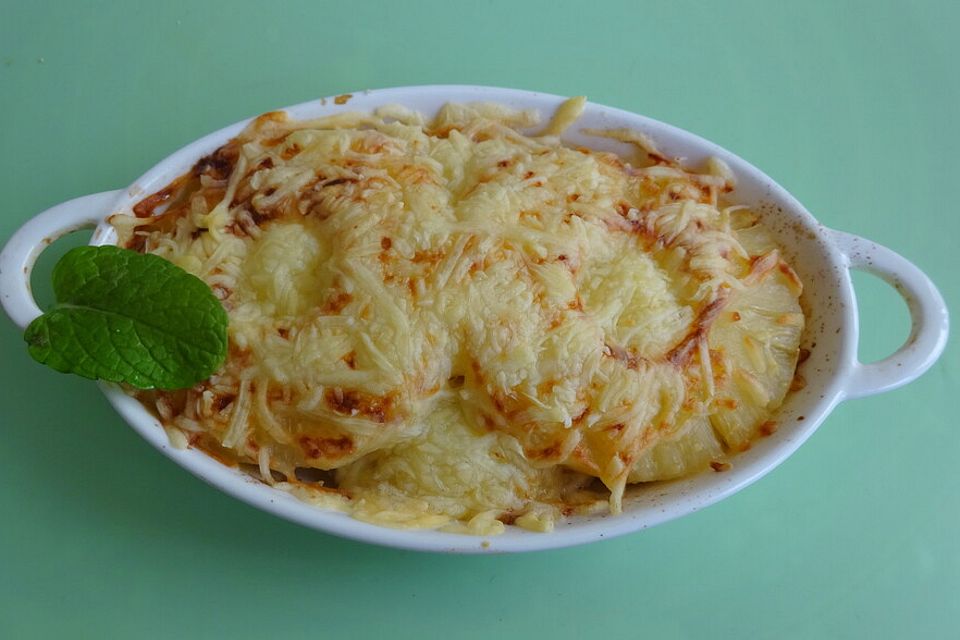 Schweineschnitzel mit Ananas, Schinken und Gouda