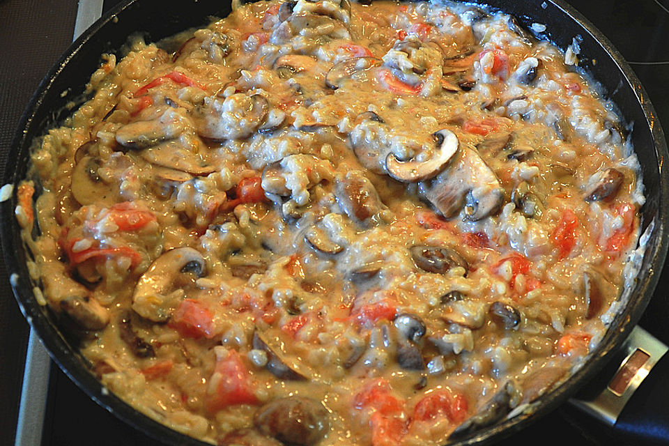 Risotto mit Tomaten und Champignons