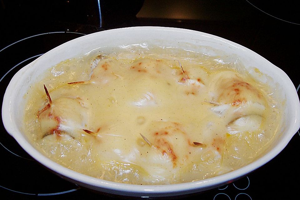 Fischröllchen in Weinsauce