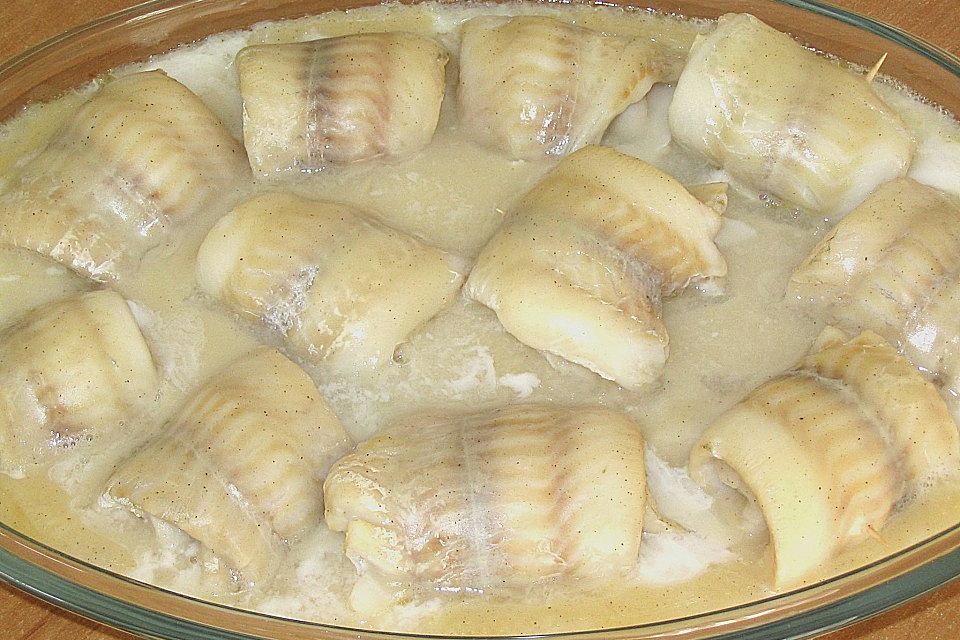 Fischröllchen in Weinsauce