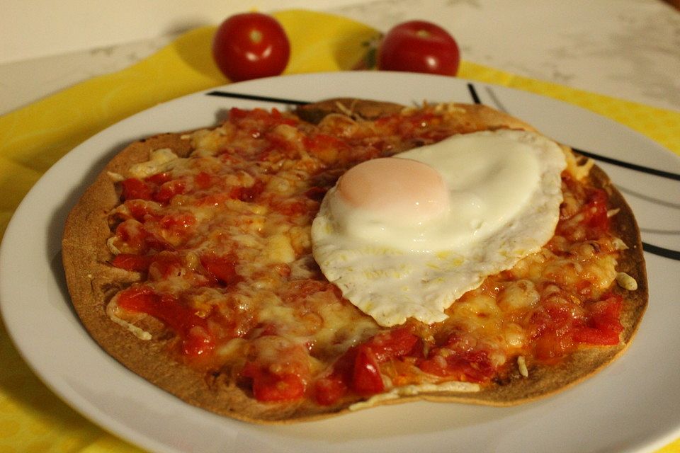 Mexikanische Spiegeleier auf Mais - Tortillas