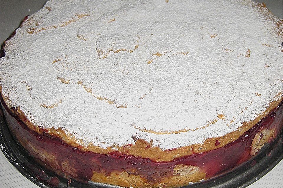 Gedeckter Kirschkuchen