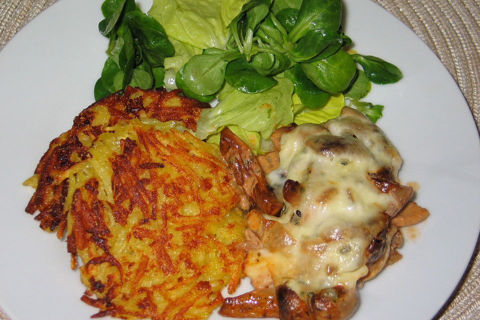 Schnitzelpfanne mit Pilzen und Mozarella