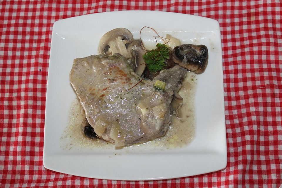 Kotelett in Champignon - Sahnesauce