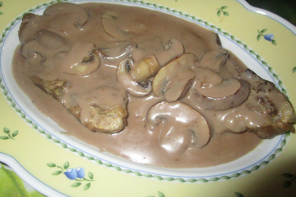 Kotelett in Champignon - Sahnesauce