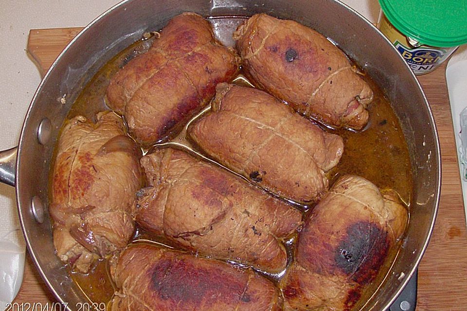 Schweineschnitzel mit Schinken und Ei