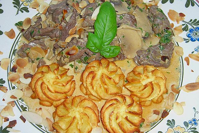 Straußengeschnetzeltes mit Champignons &amp; Mandeln in Cognac - Sahnesoße ...