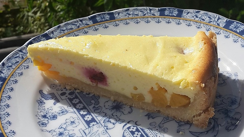 Kasekuchen Mit Pfirsichen Und Heidelbeeren Chefkoch 