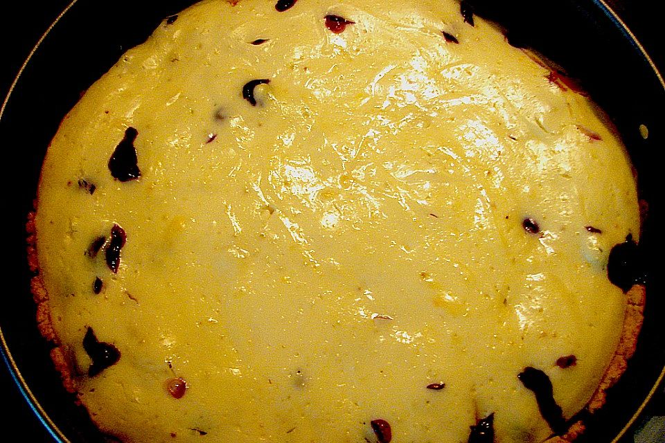 Käsekuchen mit Pfirsichen und Heidelbeeren Käsekuchen mit Pfirsichen und Heidelbeeren