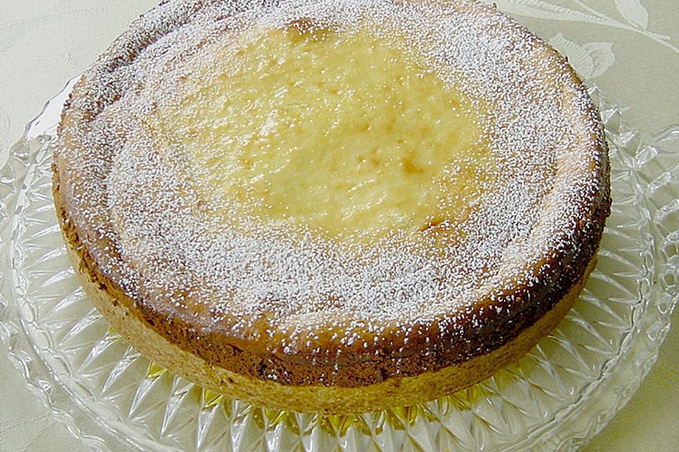 Käsekuchen mit Pfirsichen und Heidelbeeren Käsekuchen mit Pfirsichen und Heidelbeeren