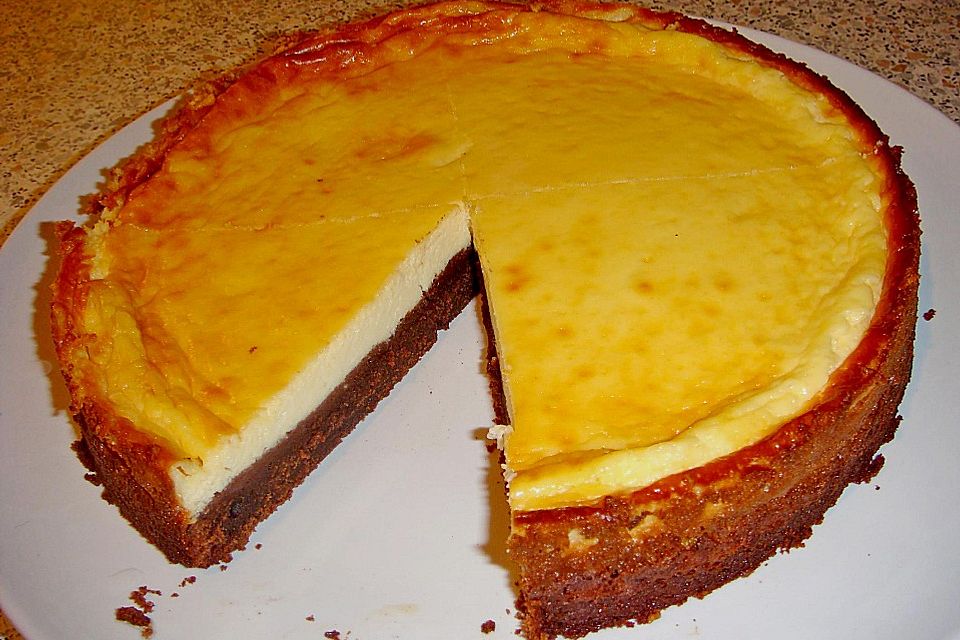 Käsekuchen  mit  Brownie Boden