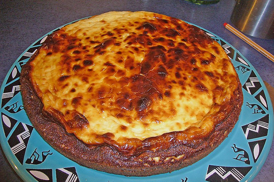 Käsekuchen  mit  Brownie Boden