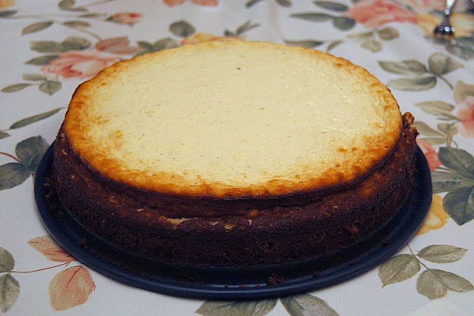 Käsekuchen  mit  Brownie Boden