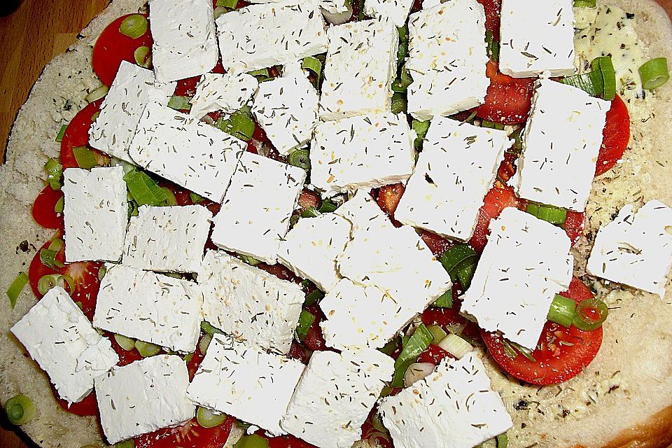 Fladenbrot mit Tomaten und Feta - Käse gefüllt