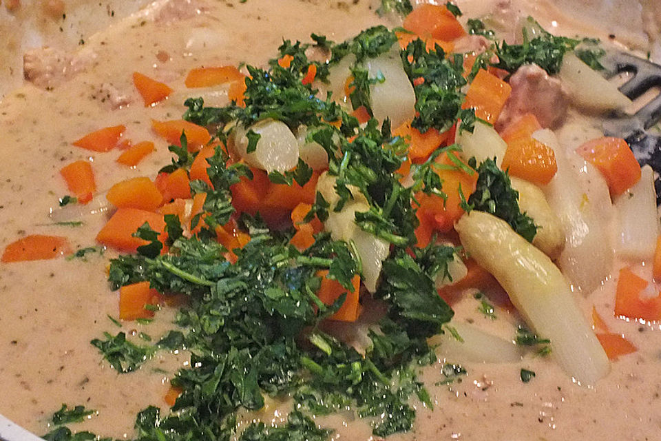 Puten-Spargel-Ragout in Orangensauce