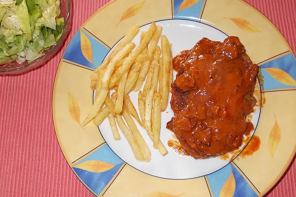 Schnitzel in pikanter Tomaten - Sahne - Sauce