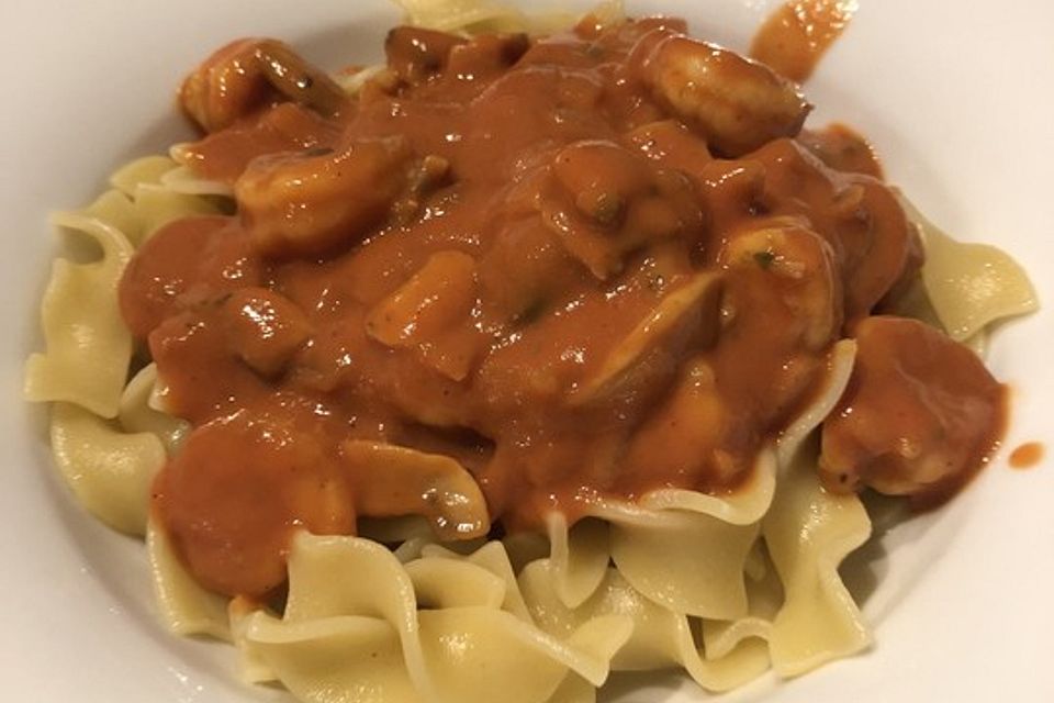 Bandnudeln mit Krabben und Pilzen