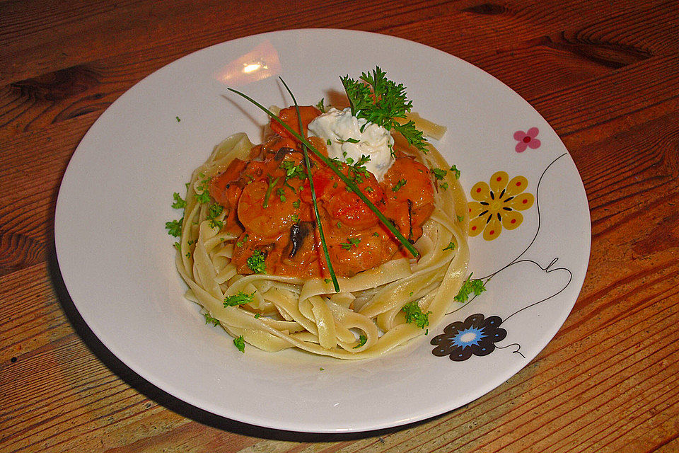 Bandnudeln mit Krabben und Pilzen