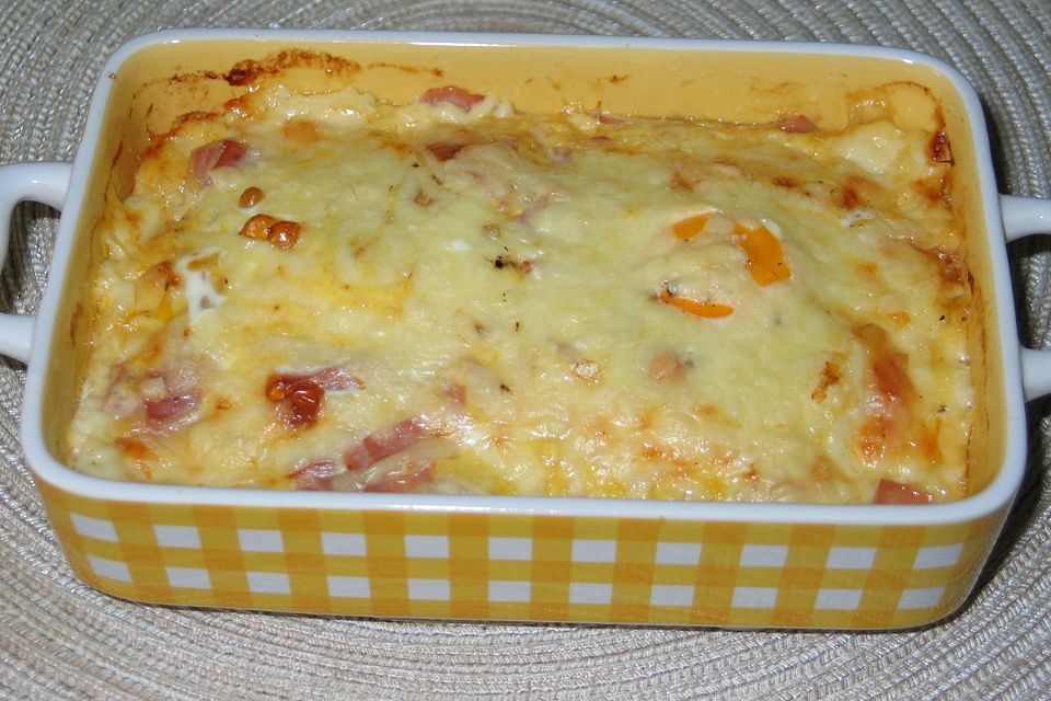 Versunkene Eier mit Schinken und Käse