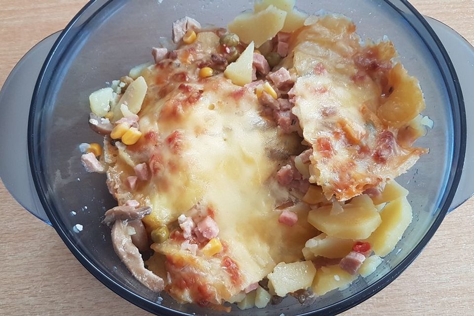 Kartoffelauflauf mit Gemüse und Schinken