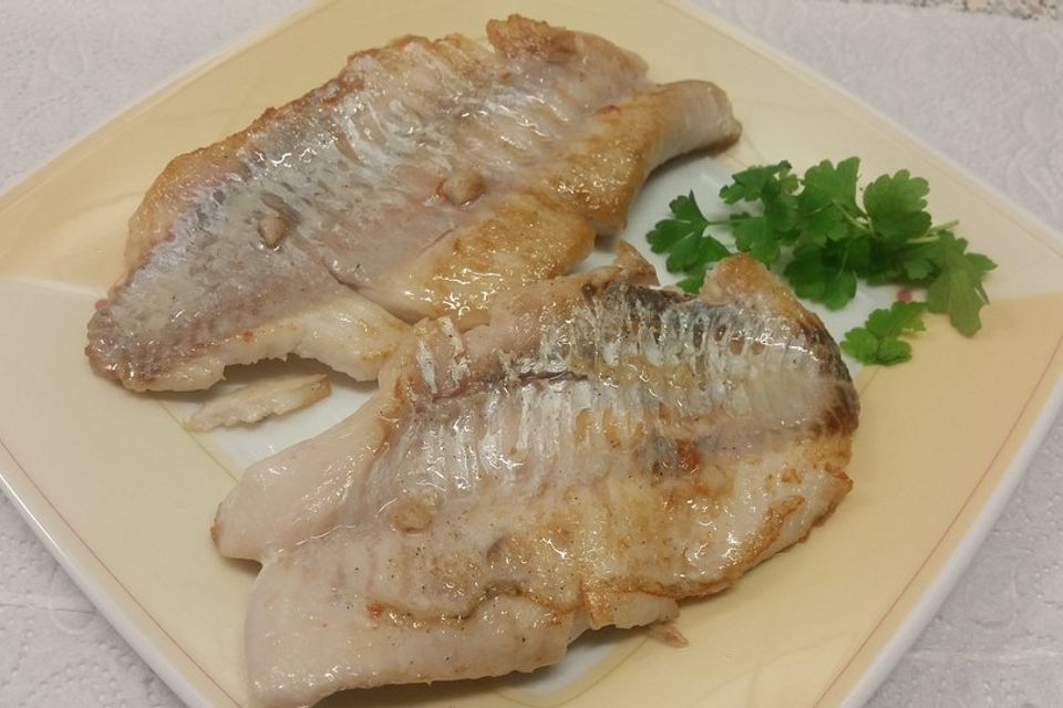 Fisch in Knoblauchöl