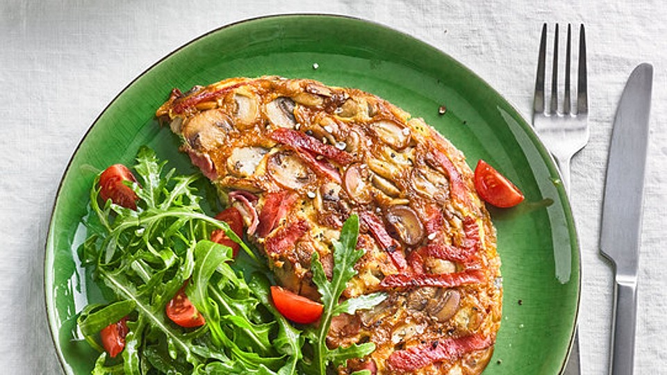 Omelett-mit-gekochtem-Schinken-und-Champignons