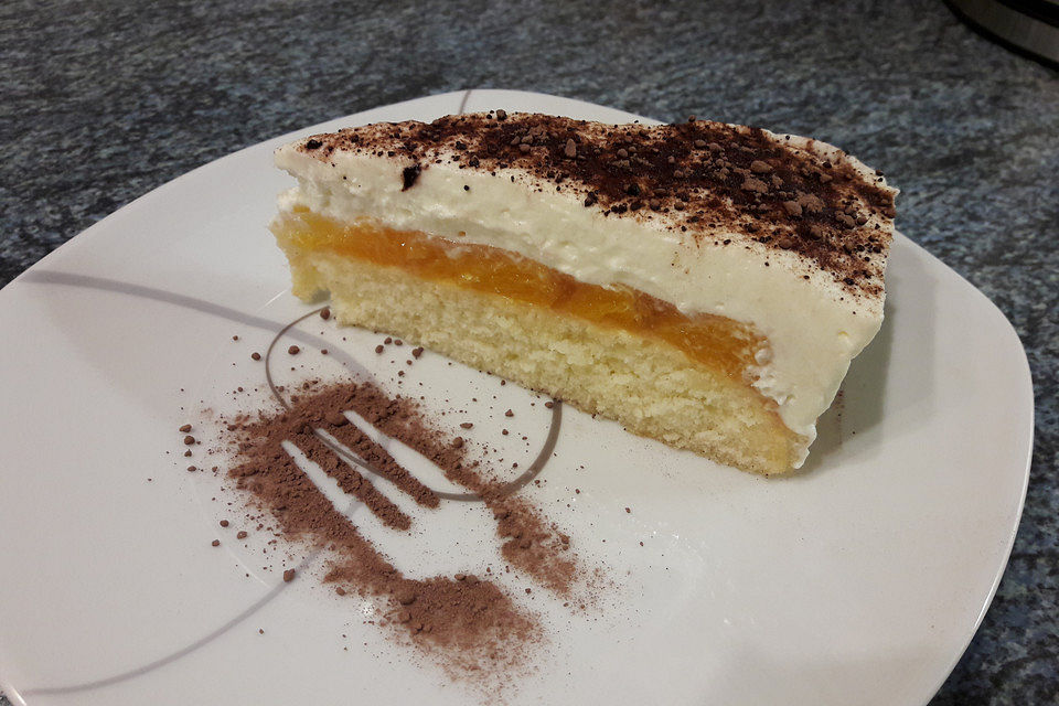 Schmandkuchen auf dem Blech mit Mandarinen