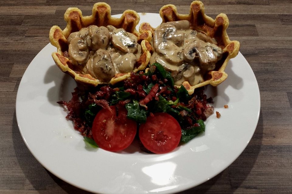 Champignons in Weißweinsauce auf Rösti