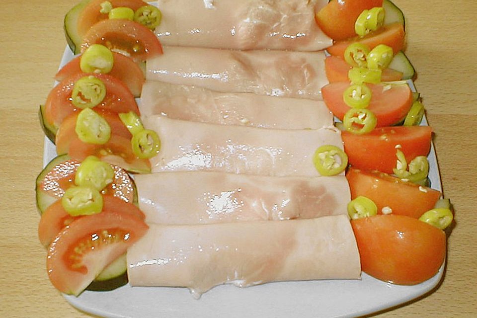 Schinkenrollen mit grünen Salat