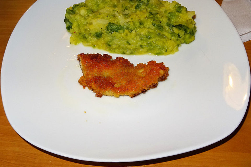 Schnitzel im Kartoffelmantel mit Spitzkohlgemüse