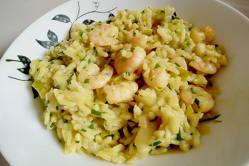 Risotto mit Curry, Blumenkohl und Scampi aus dem Wok