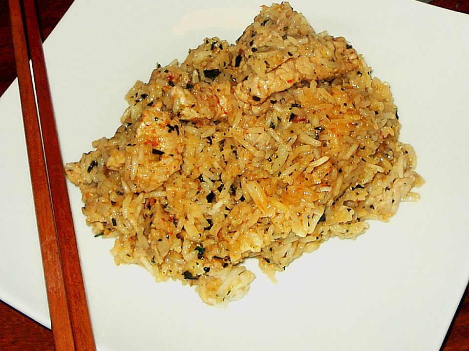 Scharfer Reis mit Schwein, Knoblauch und Basilikum von Senor-S| Chefkoch