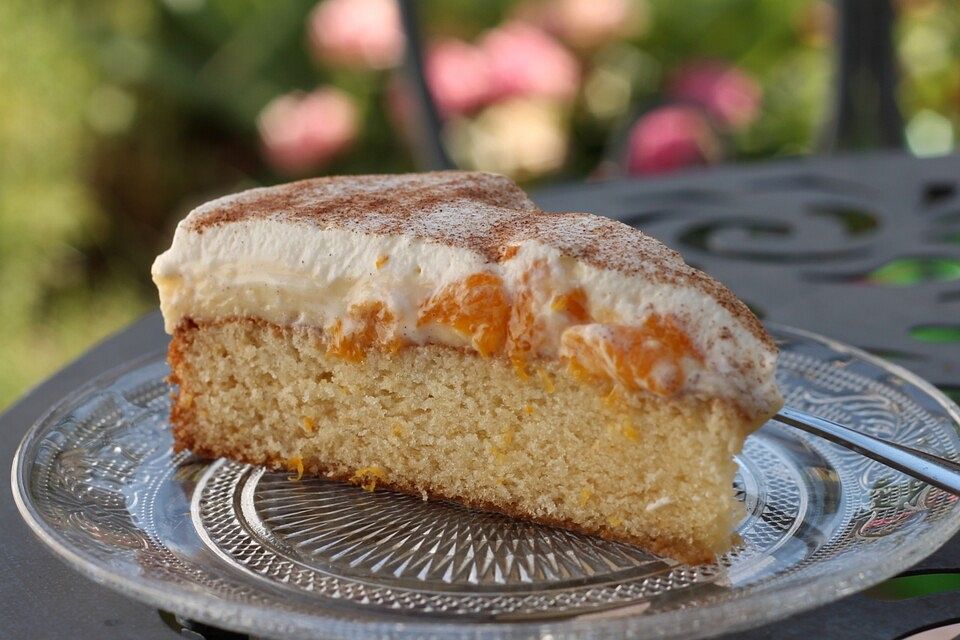 Fanta - Schmand - Kuchen mit Pudding und Mandarinchen