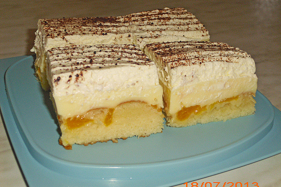 Fanta - Schmand - Kuchen mit Pudding und Mandarinchen