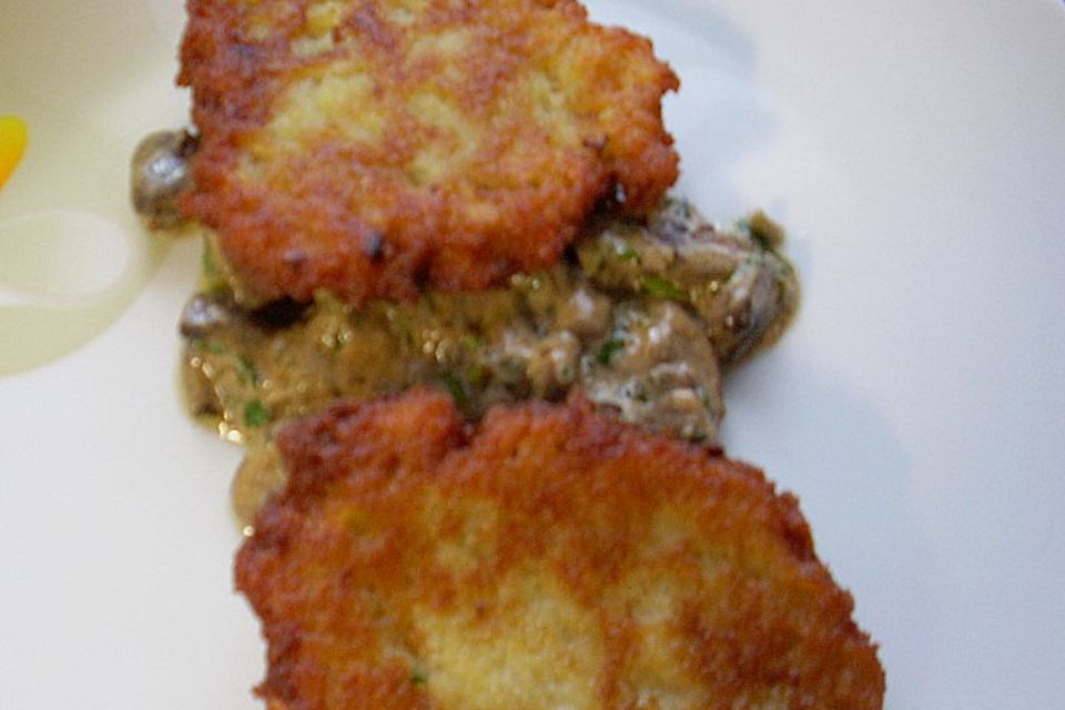 Kartoffelpuffer auf Cremechampignons