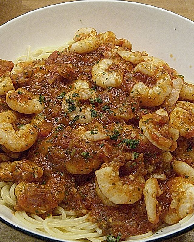 Spaghetti mit King Prawns in scharfer Kräuter - Knoblauch - Tomatensauce