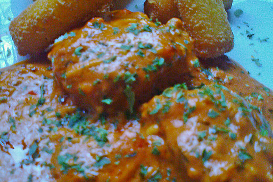 Schweinemedallions überbacken mit Metaxa - Käsesauce