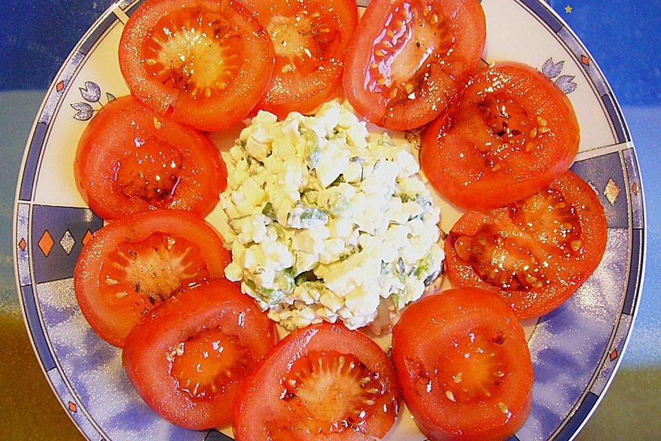 Tomatencarpaccio mit Hüttenkäse