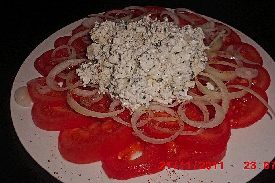 Tomatencarpaccio mit Hüttenkäse